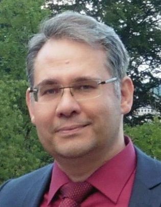 evangelischer Pfarrer Andreas Beck, freundliches Lächeln, graue Haare mit rechtem Seitenscheitel, randlose Brille (c) Andreas Beck evangelischer Pfarrer Andreas Beck, freundliches Lächeln, graue Haare mit rechtem Seitenscheitel, randlose Brille