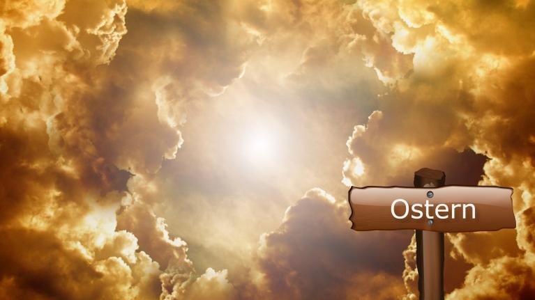 Das Plakat zeigt neben den Informationen zur Veranstaltung ein Foto, das den Himmel mit Wolkendurchbruch in goldenen Farben erscheinen lässt.